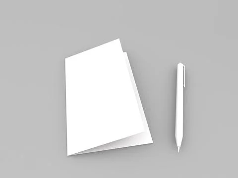 Blank notepad and pen on a simple grey background ready for writing notes o.. Ilustración de archivo