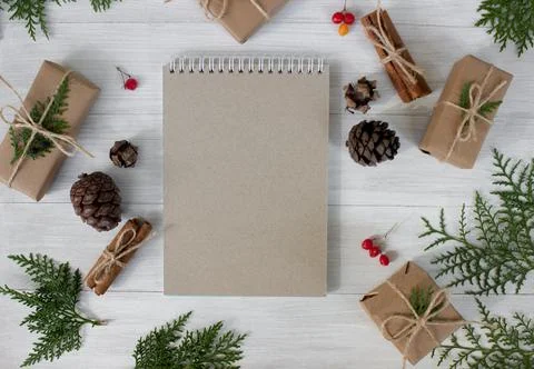 Blank notepad on the background of New Year's decorations Space for text Stock Photos