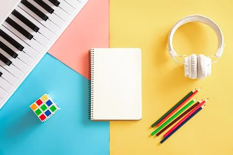 Blank notepad on colored background, creativity concept, flat lay, minimalism. Stock Photos