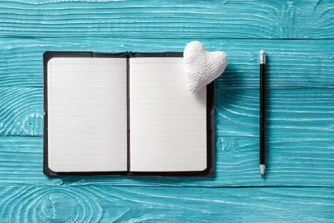 Blank notepad for copy space and vintage handmaded valentines day toy heart o Stock Photos