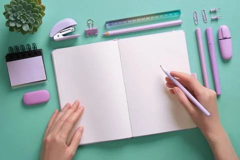 Blank notepad page for your text in a pastel colored stationery frame. Woman' Stock Photos