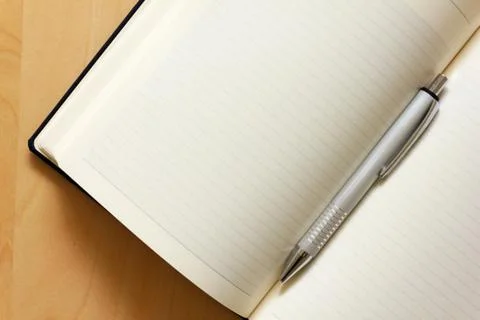Blank notepad with pen Stock Photos
