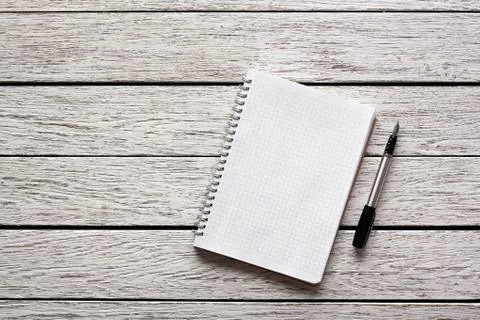 Blank notepad with a pen Stock Photos