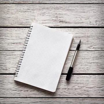 Blank notepad with a pen Stock Photos