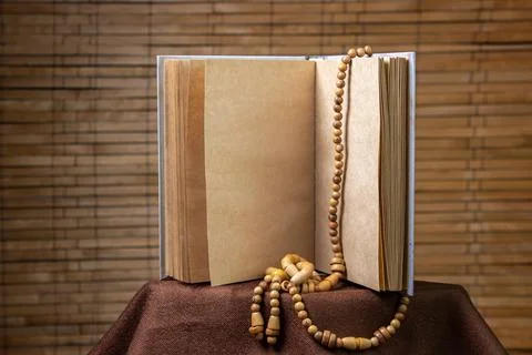 Blank notepad on a wooden background. Old paper notebook.  Stock Photos