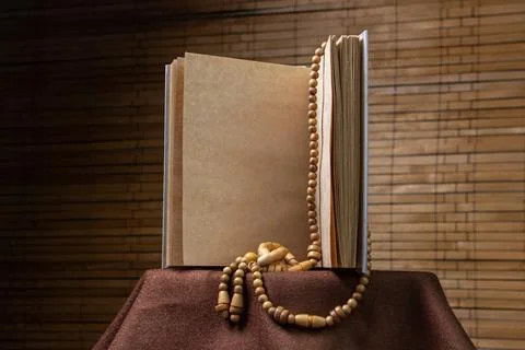 Blank notepad on a wooden background. Old paper notebook.  Stock Photos