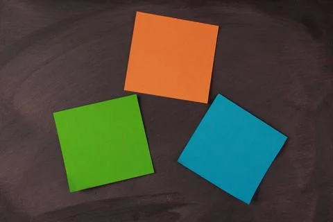 Blank Notes Pasted On Blackboard Blank notes pasted on blackboard which ca... Stockfoto's