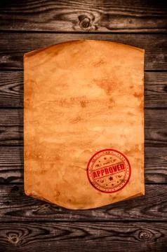 Blank old paper against the background of an aged wood Stock Illustration
