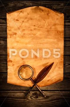 Blank old paper against the background of an aged wood Stock Photos