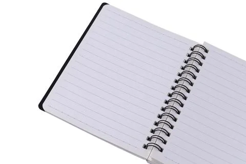 Blank open spiral lined notebook laying flat isolated on a plain white back.. Stock Photos