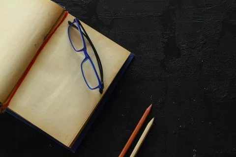 Blank opened advertising folder isolated on black background. 스톡 사진