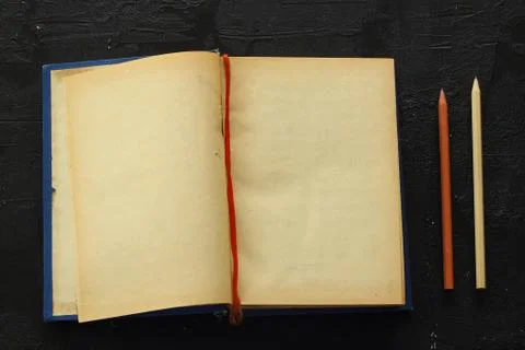 Blank opened advertising folder isolated on black background 스톡 사진