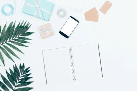 Blank opened notepad among flat lay holiday border 库存照片