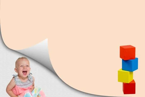 Blank page with curl effect and towerand laughing toddler girl Stock Photos