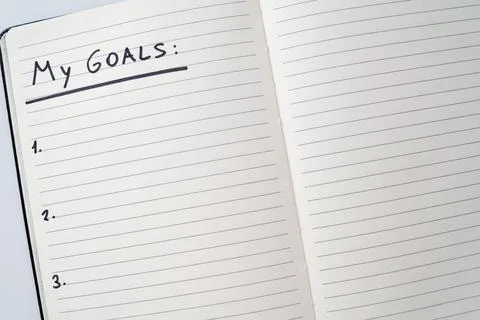 Blank page of diary with text "my goals". Stock Photos