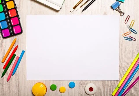 Blank page mockup on table with office tools Stock Photos