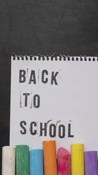Blank page of a notebook with the phrase "Back To School" written in English  Stock Photos