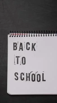 Blank page of a notebook with the phrase "Back To School" written in English  Stock Photos
