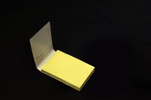 A blank page in the Notepad on the table in a white background 写真素材