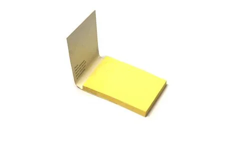 A blank page in the Notepad on the table in a white background 写真素材