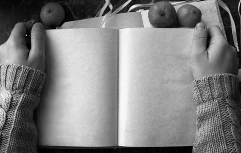 Blank pages opened vintage book on the table Stock Photos