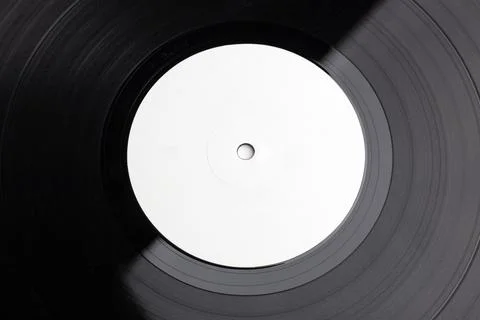 Blank paper circle in the middle of a pressed lp record Stock Photos