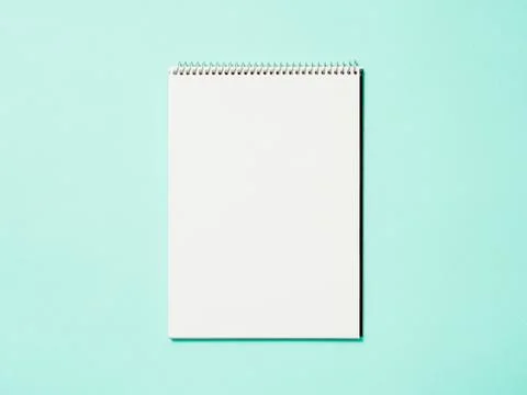 Blank paper notebook on blue background Stock Illustration