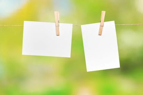 Blank paper notes with copy space pinned on rope Stock Photos