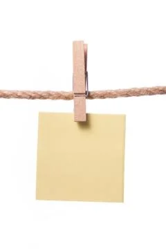 Blank paper notes hanging on rope with clothes pins, copy space Stock Photos