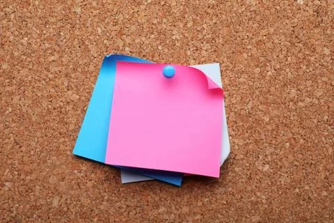 Blank paper notes pinned to cork background, closeup Stock Photos