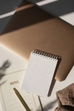Blank paper sheet flip notebook with mockup copy space. Boho styled workspace Stock Photos