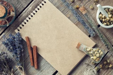 Blank Paper Sheet for text, vials and bottles with healing herbs Stock Photos