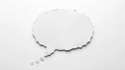 Blank paper speech bubble with torn edges isolated on a white background Stock Photos