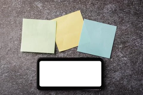 Blank paper stick note list with the modern smart mobile phone Stock Photos