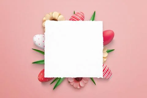 Blank paper surrounded with Easter eggs and decorations for promo greeting te Stock Photos