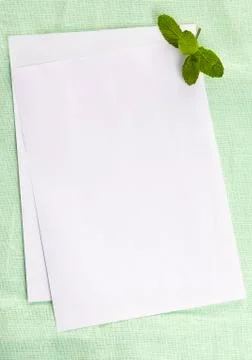 Blank paper on the table textile background Stock Photos