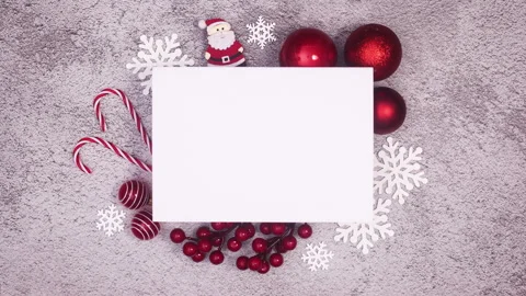 Blank paper for text surrounded with Christmas ornaments. Stop motion Stock Footage 163011669