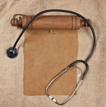 Blank parchment scroll and stethoscope Stock Photos