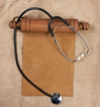 Blank parchment scroll and stethoscope Stock Photos