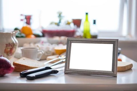 Blank picture frame on dining table Stock Photos
