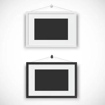 Blank picture frame set hanging on wall Stock Illustration