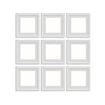 Blank picture frame template set isolated on wall Illustrazione stock