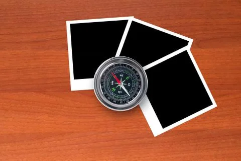 Blank picture frames and compass Stock Photos