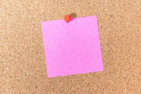 Blank pink note and push pin on cork board. Template to ad text or drawing... Stock Photos