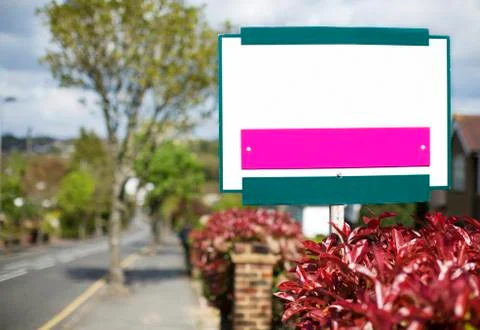 Blank placard sign outside a house on a main road Stock Photos
