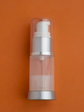 Blank Plastic Airless Pump Bottle With silver Cover, Transparent Cap, Paper.. Stock Photos
