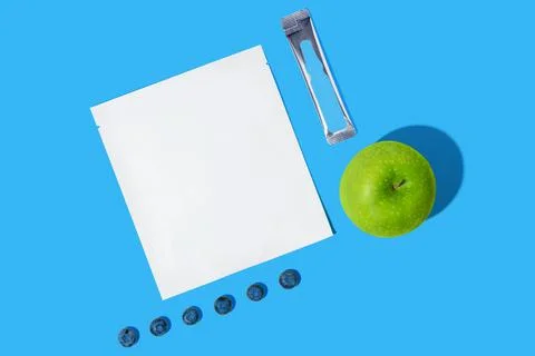 Blank plastic package for face mask with cosmetic serum Stock Photos
