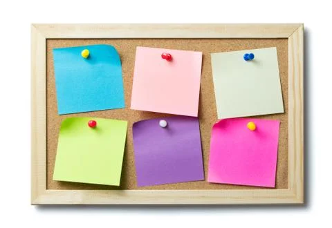 Blank post it notes on a cork notice board Stock Photos
