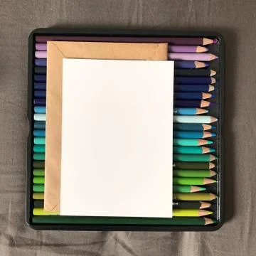 Blank Postcard with Envelope and Colored Pencils Stock Photos