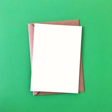 Blank Postcard with Envelope on Green Background Stock Photos